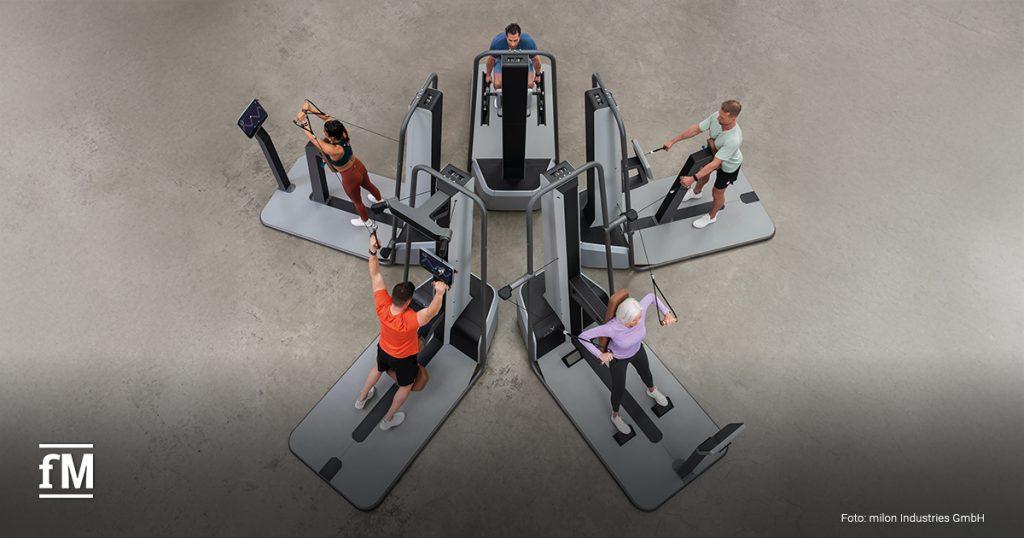 Im Bild trainieren fünf Trainierende am neuen milon X Trainingszirkel
