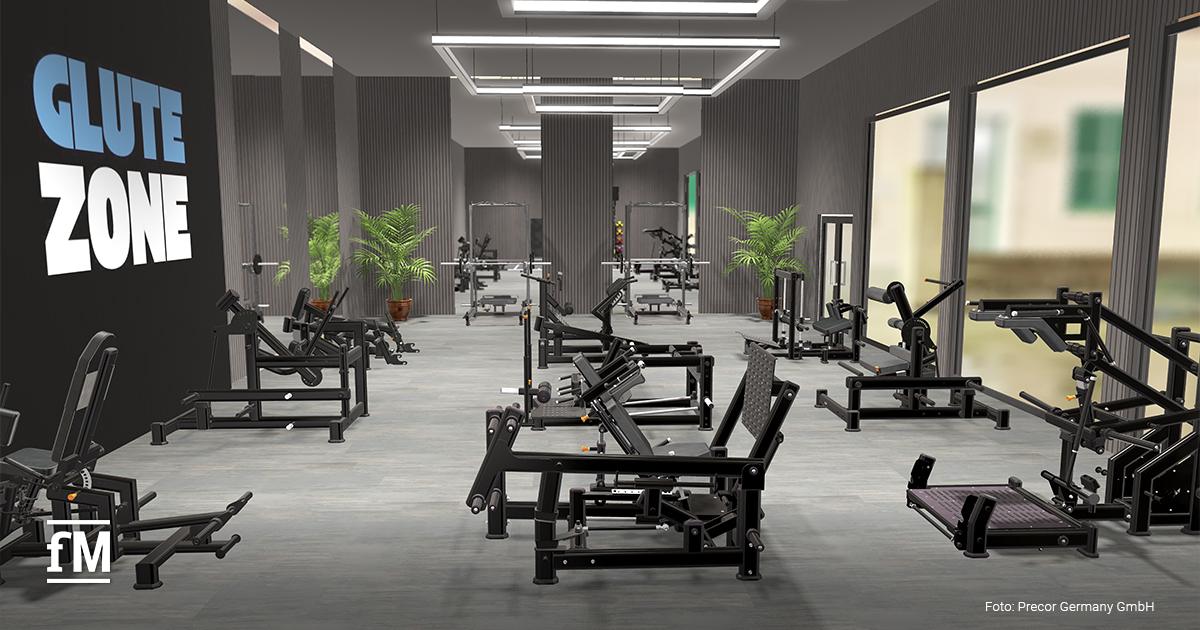 Ein Fitnessstudiobereich mit Glutebuilder- und Precor-Geräten in moderner Anordnung.